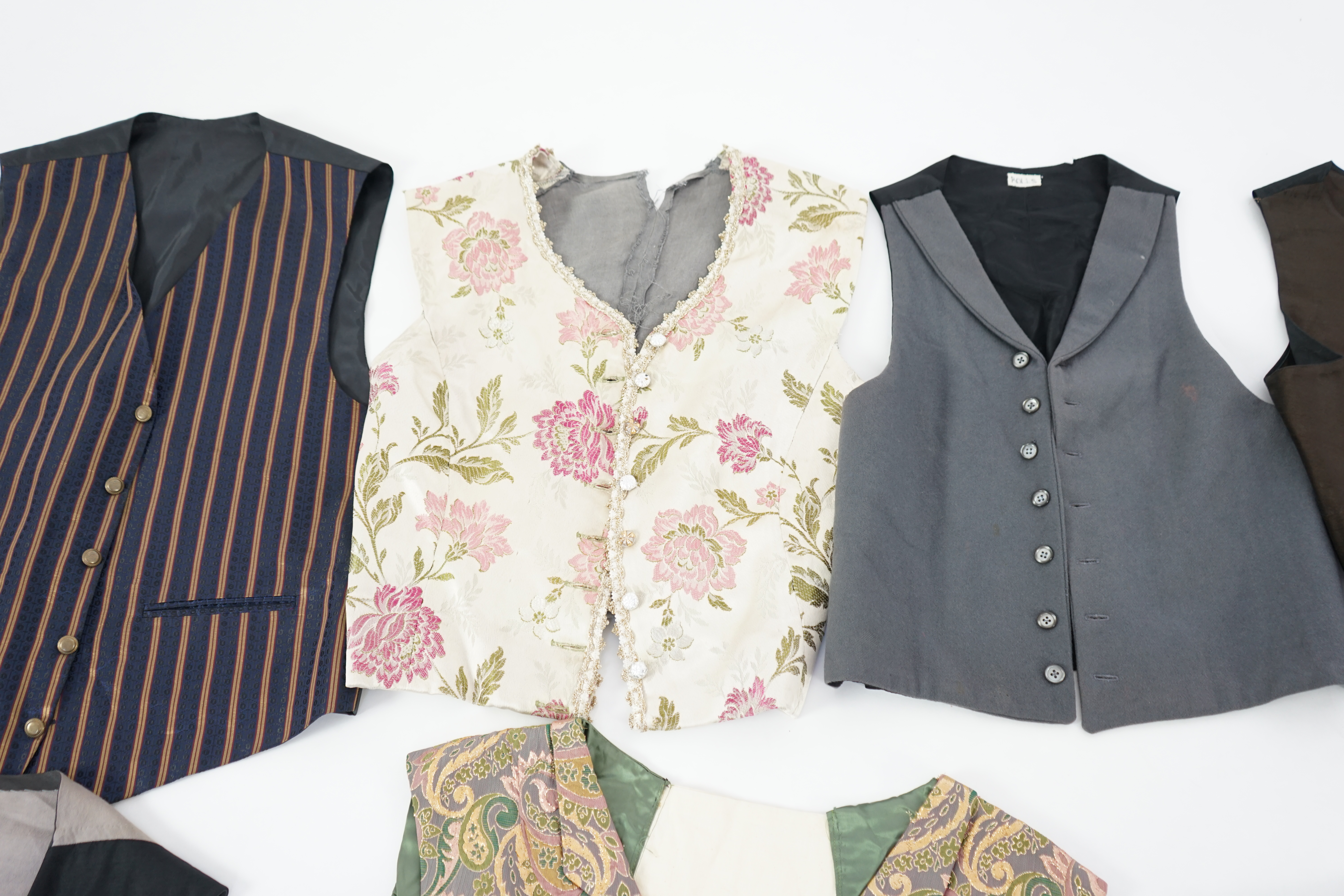 Eight men's assorted period waistcoats. Ex Pavilion Opera Sale